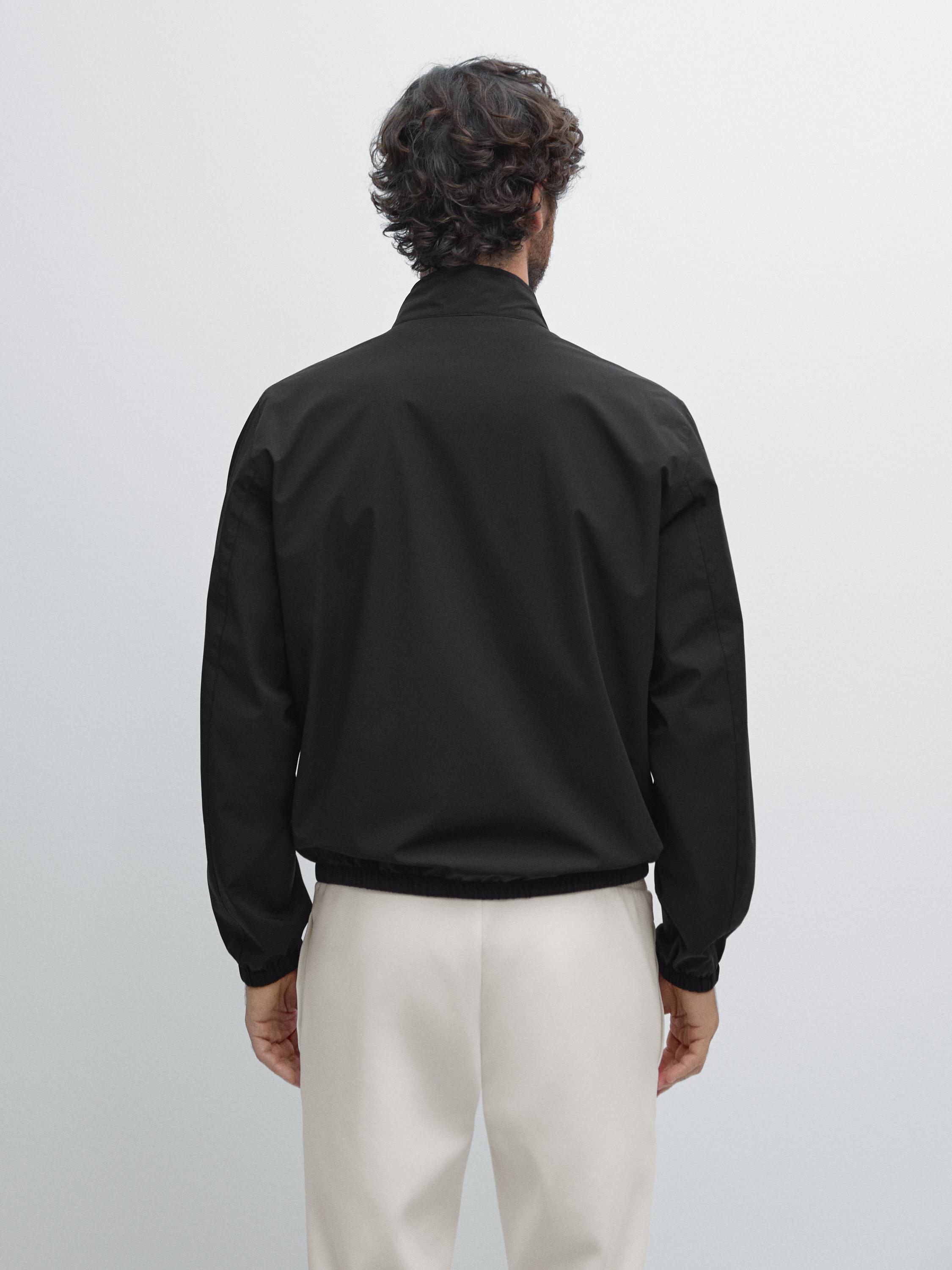 Veste réversible à col montant